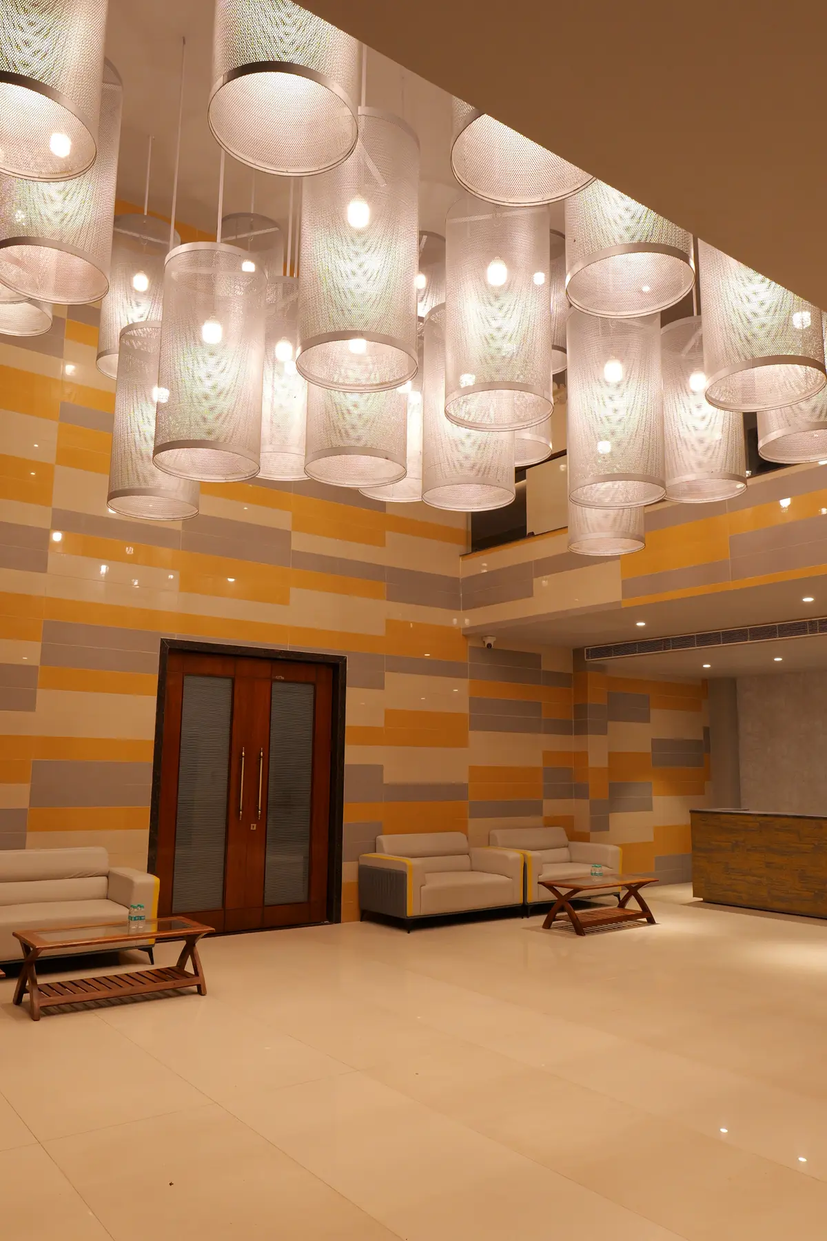 Hotel lobby with sculptural pendant lights